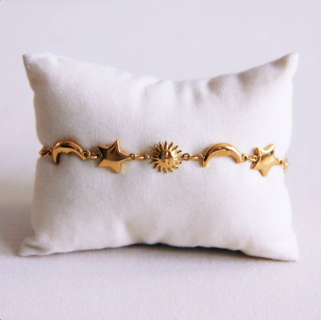 Schakelarmband met zon, maan en ster